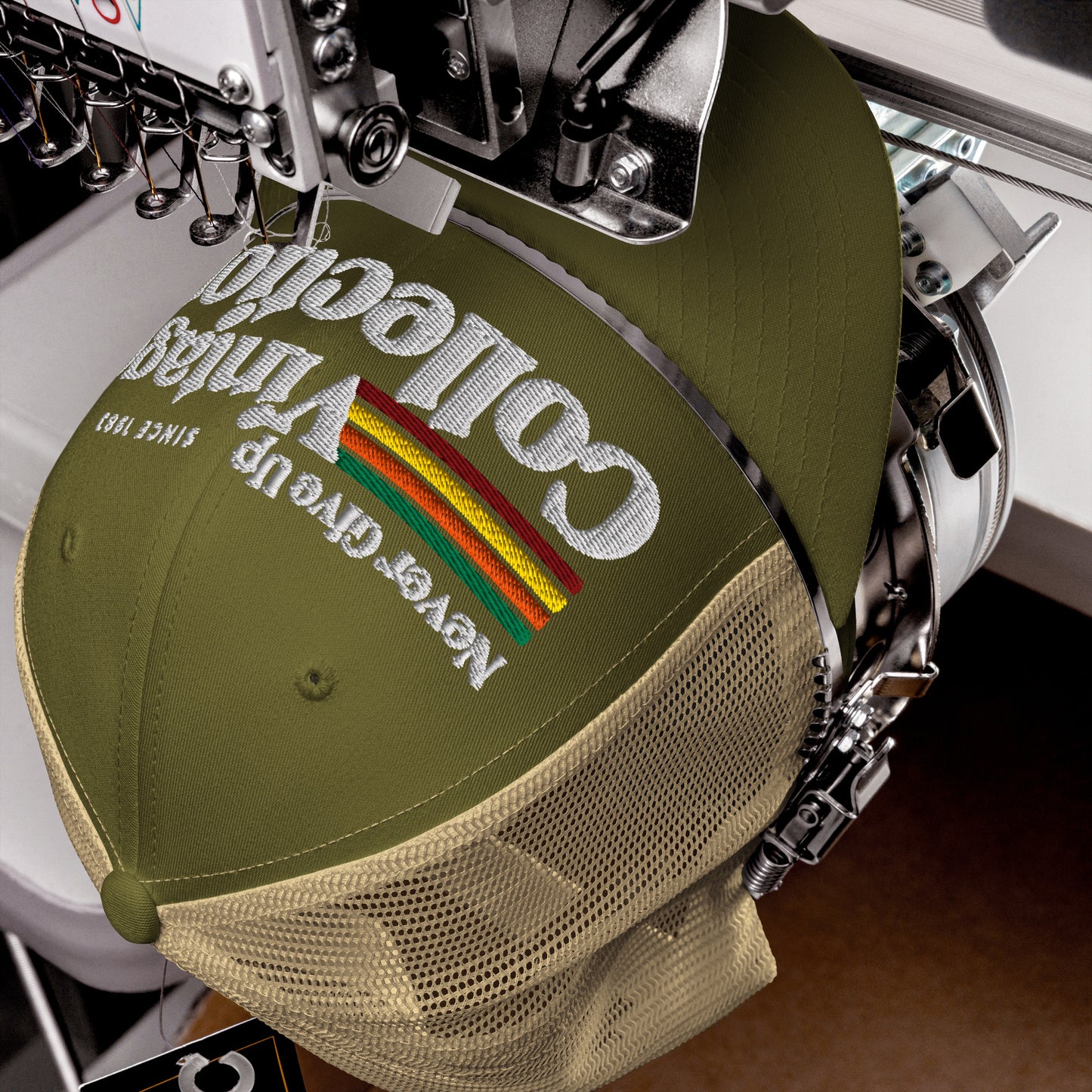 Retro Collection trucker cap with embroidered text and rainbow detail.