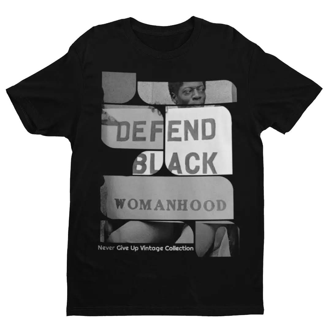 Black t-shirt with "Defend Black Womanhood" graphic.