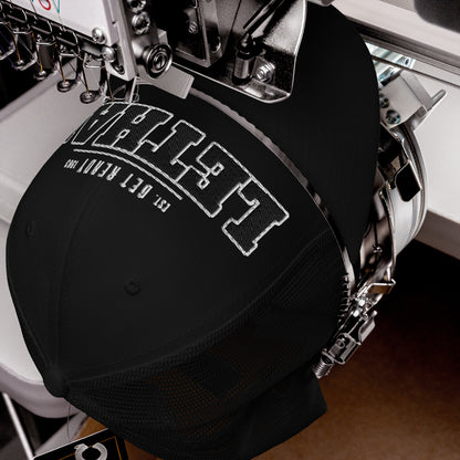 Black trucker cap with white embroidered text and mesh back.