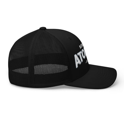 Black trucker cap with "School Of Atomics" embroidered on the front.
