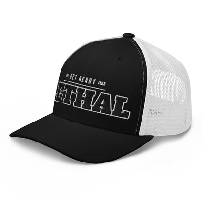 Black and white trucker cap with white mesh back and embroidered text.