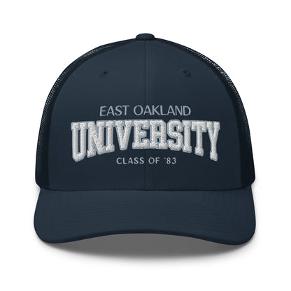 East Oakland University trucker cap with embroidered text.