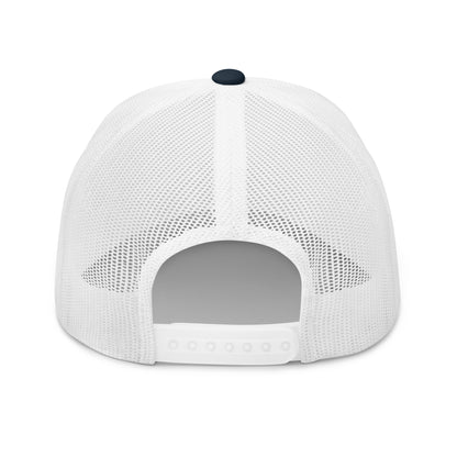A white mesh trucker cap with a dark blue button on top.
