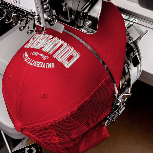 Red trucker cap with white "Columbus" and "University of Ohio" embroidery.
