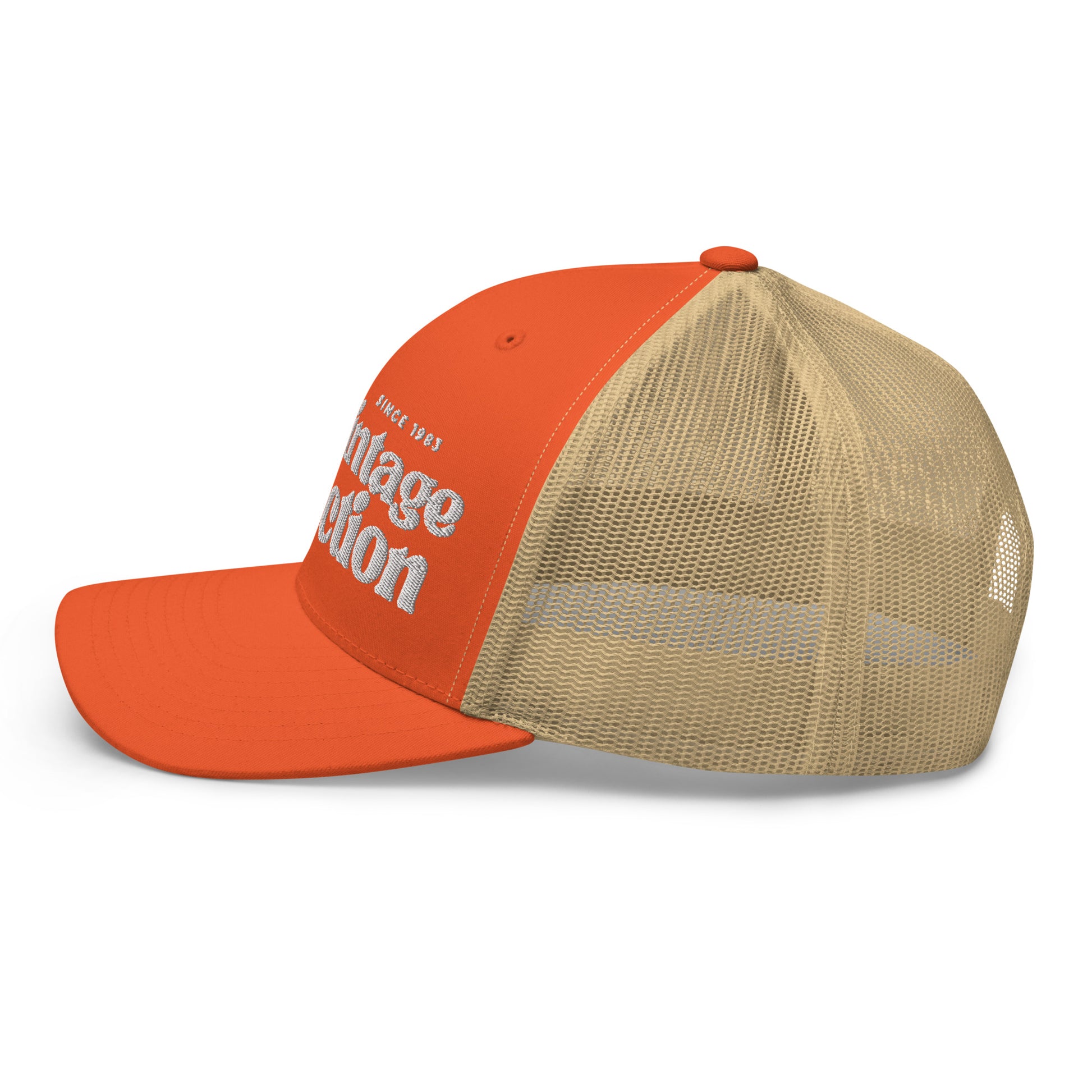 Retro Collection Trucker Cap in orange with white embroidery and a tan mesh back.