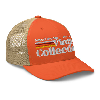 Retro Collection Trucker Cap with orange front and tan mesh back.