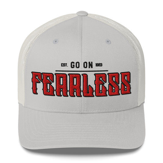 A light grey trucker cap with white mesh back and "FEARLESS" embroidered in red.