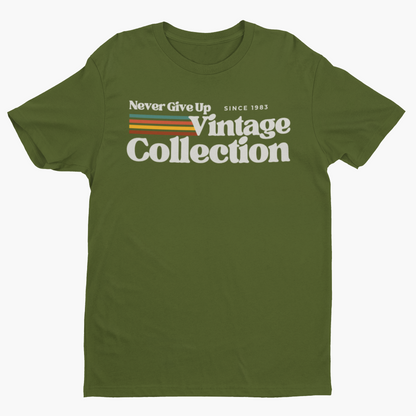 Olive green t-shirt with "Never Give Up Vintage Collection Since 1983" graphic.